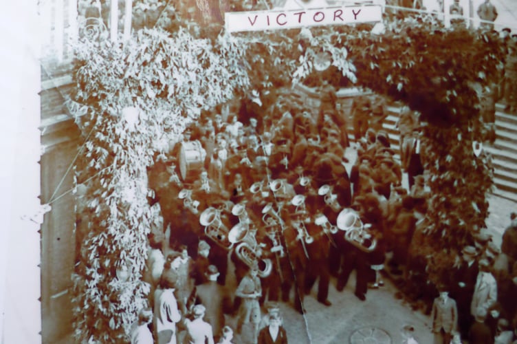 Barrie says of this photograph: “VE Celebrations May 8, 1945 at Bodmin. Photo taken from the top of the Palace Cinema. The only one a recognise in the photo is Charlie Wall playing the bass Drum in the Town Band. He was still playing the drum when I joined the band in the 1950's.”