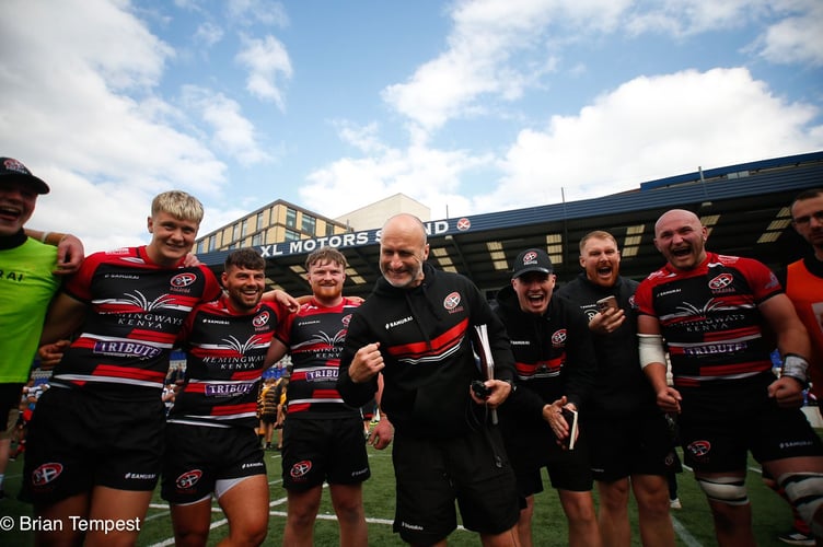Cornish Pirates joint head coach Gavin Cattle celebrates with his side following their win at Coventry. 