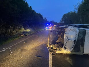 Driver flees scene after overturning van 