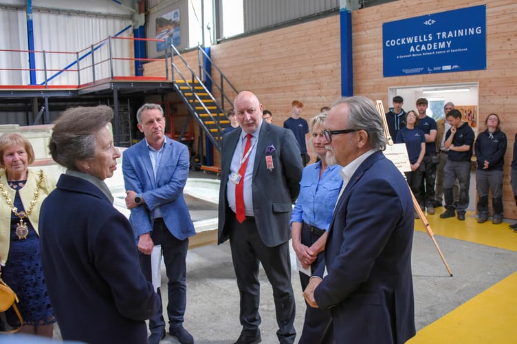 Mayor of Penryn Mary May, HRH The Princess Royal, Dave Cockwell, Paul Wickes MBE, Jo Cockwell and Stephen Hills discuss the Cockwells Training Academy.