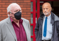 Former police officers appear in court charged with rape of child