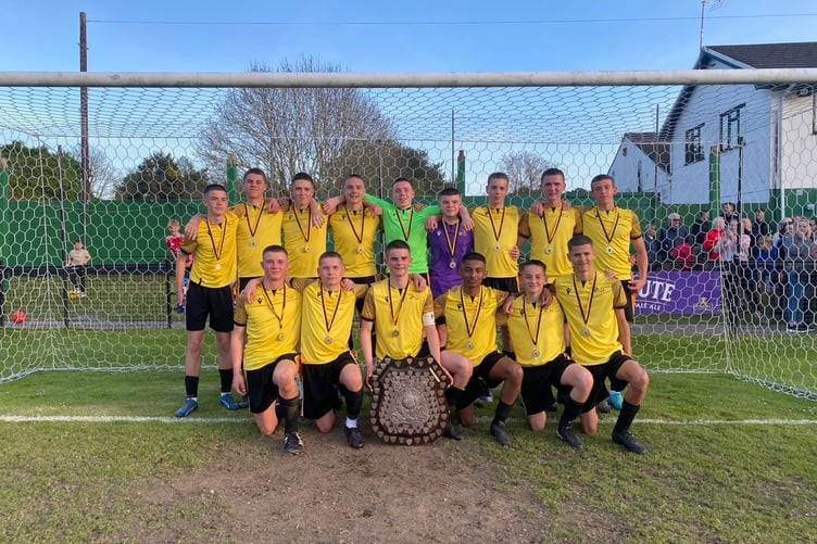 The Year 10 Penrice team display their trophy.