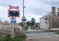 Level crossing closed following opening of new road
