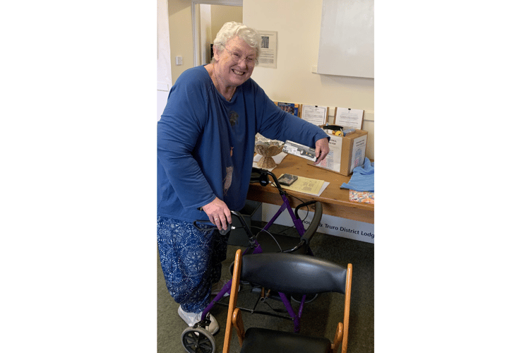 Alison tops up the shoe box appeal.jpeg