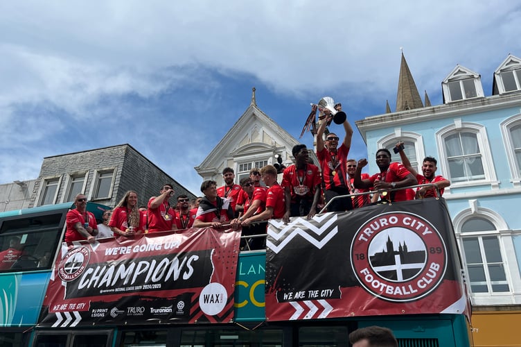 Truro City FC on the bus in Boscawen Street