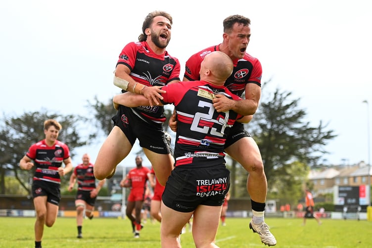 Dan Hiscocks and Will Trewin, pictured celebrating with try-scorer Will Yates at a recent home game against Hartpury, will hope for more of the same in the 2025/26 campaign. Picture: Brian Tempest