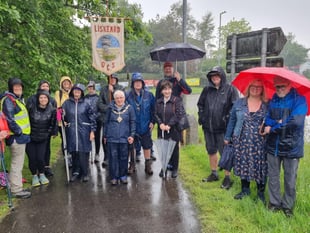 Hearty souls brave the rain for Beating of the Bounds event