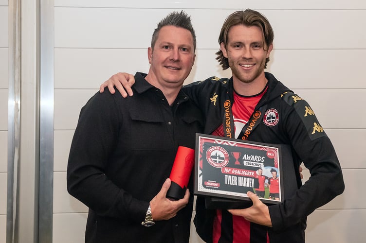 Truro striker Tyler Harvey with club sponsor Dan Sleeman - Picture: Colin Bradbury.