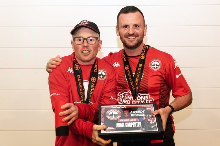 Stewart Yetton hands over the City’s Unsung Hero Award to long-serving club kit man Adam Carpenter. Picture: Colin Bradbury.