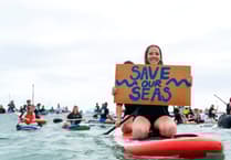 Protestors turn out in force to express anger over sewage scandal