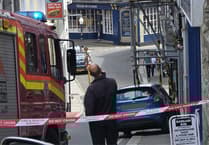 Liskeard street shut after car collides into scaffolding