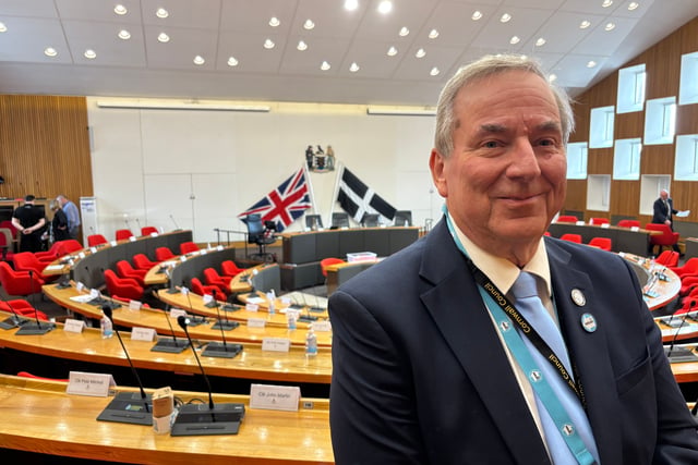 Former Reform leader crosses floor to Conservative benches