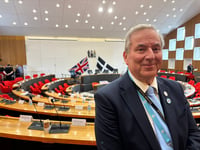 Former Reform leader crosses floor to Conservative benches