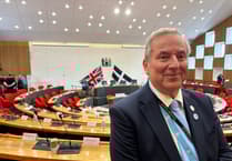 Former Reform leader crosses floor to Conservative benches