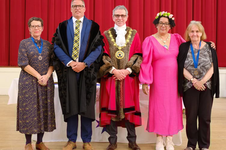 Civic Deputy Cllr Penny Osborne, Town Clerk James Hardy, Mayor of Penzance Stephen Reynolds, Deputy Mayor Nicole Broadhurst, Civic Deputy Bonnie Jackson. The 45th Annual Mayor Choosing Ceremony of Penzance Council held in St John's Hall, Penzance, on Monday 19 May 2025. Photo by Penzance Council