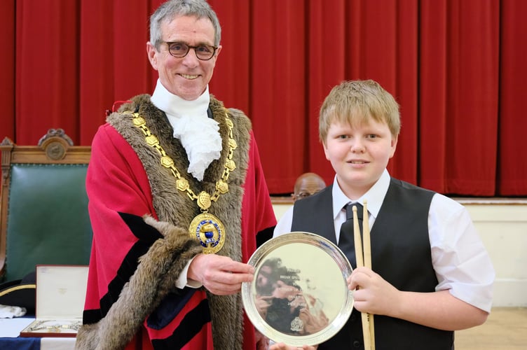 Mayor of Penzance Stephen Reynolds with Young Citizen of the Year winner Jack James. The 45th Annual Mayor Choosing Ceremony of Penzance Council held in St John's Hall, Penzance, on Monday 19 May 2025. Photo by Penzance Council