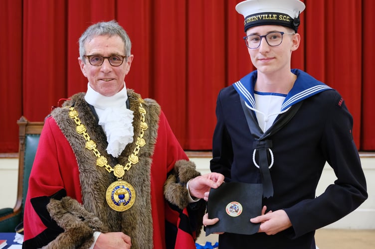 Mayor of Penzance Stephen Reynolds with Mayor's Cadet Thomas Kirk. The 45th Annual Mayor Choosing Ceremony of Penzance Council held in St John's Hall, Penzance, on Monday 19 May 2025. Photo by Penzance Council