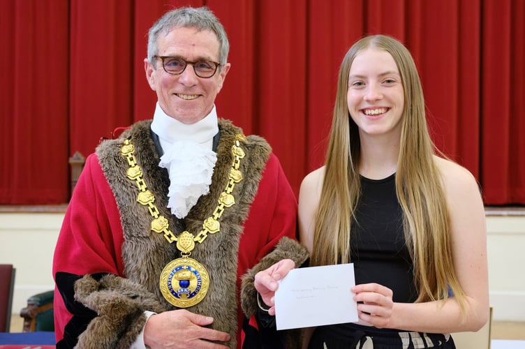 Mayor of Penzance Stephen Reynolds with Humphry Davy Prize winner Isla Mulholland. The 45th Annual Mayor Choosing Ceremony of Penzance Council held in St John's Hall, Penzance, on Monday 19 May 2025. Photo by Penzance Council