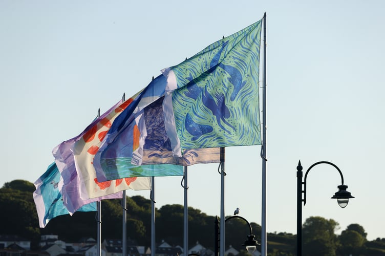 Penzance Council's popular Promenade flags return, signalling the start of summer. Photo by Penzance Council