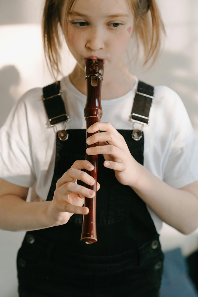 Child playing recorder