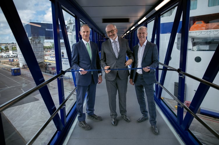 Ribbon-cutting to officially open new passenger boarding bridge at the upgraded Millbay Docks. From left to right: Julian Walker, Chief Commercial Officer and Regional Director at ABP; Christophe Mathieu, CEO of Brittany Ferries and Councillor Mark Lowry, Cabinet Member for Finance at Plymouth City Council. Image credit: Different View