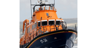 Lifeboat crew assist stranded dinghy after its outboard motor fails