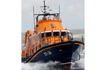 Lifeboat crew assist stranded dinghy after its outboard motor fails