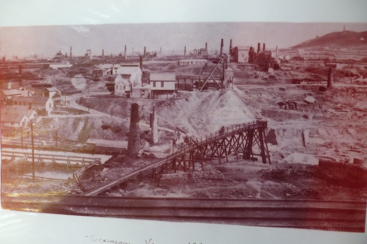 Barrie says of this photograph: “A view of Tuckingmill Valley in West Cornwall showing some of the vast mining areas in 1895. The Monument and Castle on Carn Brea can be seen in the top of the photo on the right.”