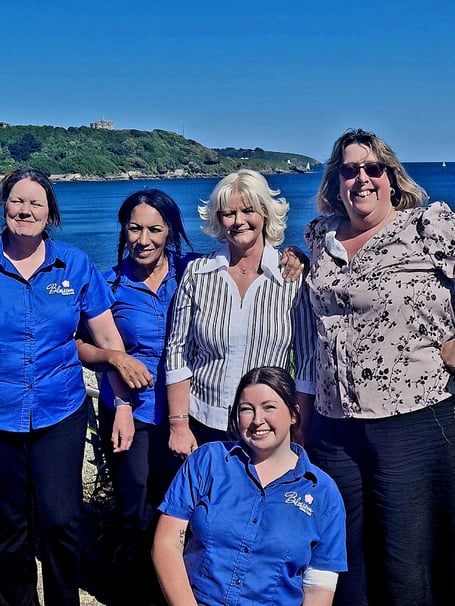 Grace Angilley (centre) with members of her care team