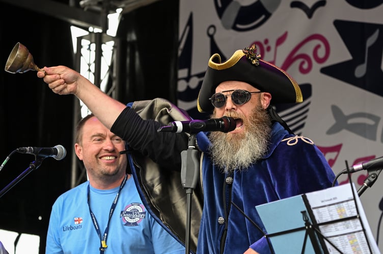 FALMOUTH, CORNWALL - JUNE 13TH 2025 : The 2025 Falmouth International Sea Shanty Festival. Photographed by Hugh Hastings of Wonderland for Falmouth Town Council. Image features Falmouth Town Crier Bobby Inman.