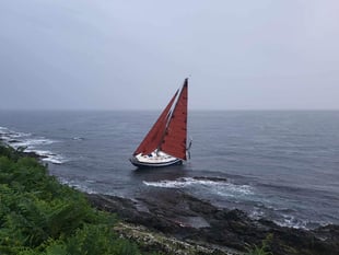 Huge search after boat found on rocks on Cornish coast