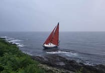 Huge search at sea after empty yacht found on rocks on Cornish coast