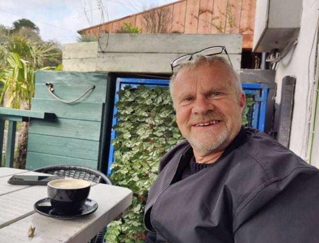 Darren Pardoe. Photo released June 16 2025. A maintenance worker who had previously carried out bird-proofing in a town was 'mugged' after his coffee was nicked by a seagull.Darren Pardoe, 60, had been carrying out a roof repair on an old lifeboat house in Porthleven, Cornwall, when he stopped for a coffee.Having recently picked up a new hobby, Darren, from Redruth, pulled out his camera to take a few pictures of the harbour.As he was snapping away, a person next to him alerted him to a seagull that was helping itself to his brew.
