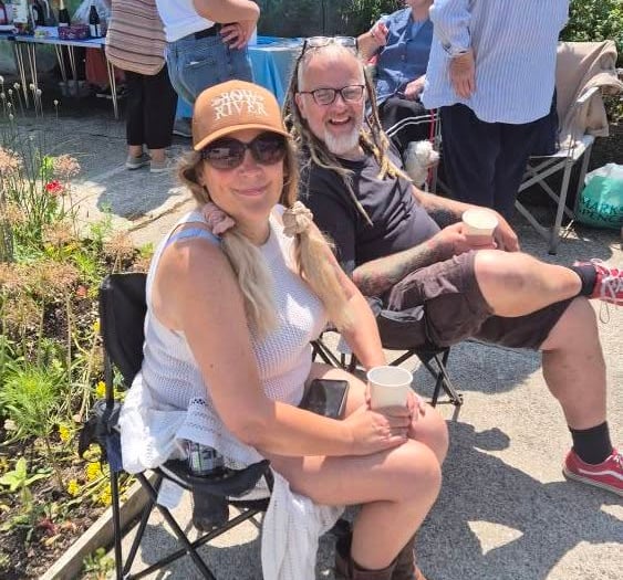 Residents come together to enjoy party at community garden