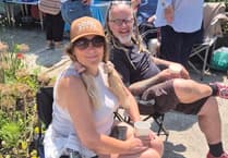 Residents come together to enjoy party at community garden