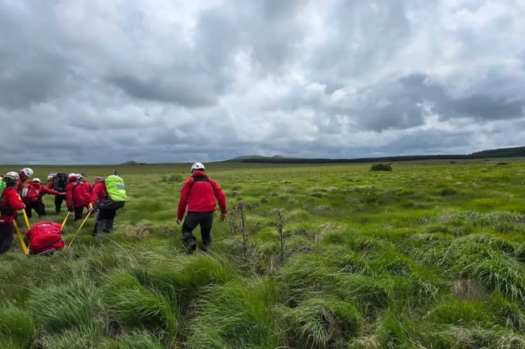 Team members stretcher hauling the casualty over marshy ground (Picture: East Cornwall SRT)