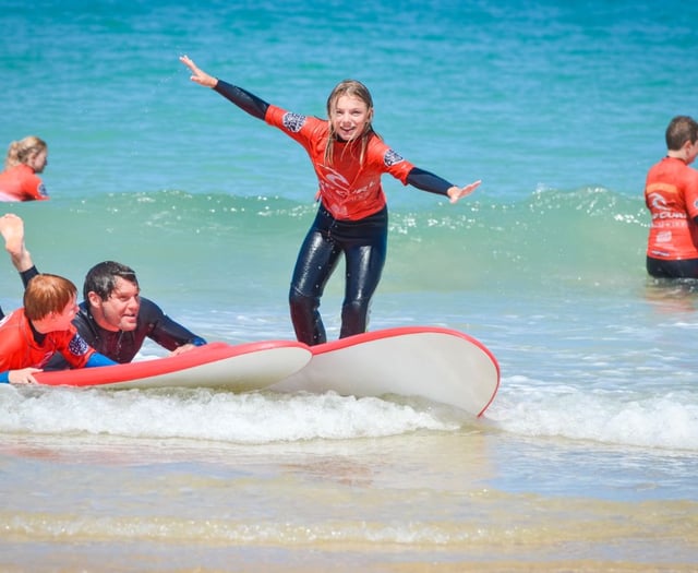 Military families enjoy surf lessons and coastal adventure