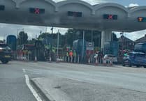 Woman taken to hospital after car overturns on Tamar Bridge