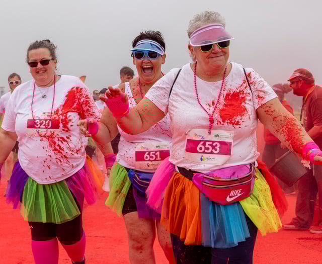 Runners covered in the colours of the rainbow for charity fun run