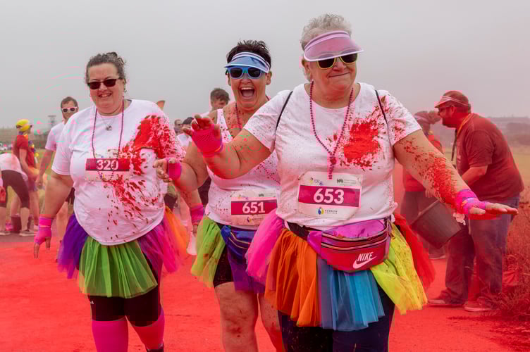 On Saturday 21 st June, RAF St Mawgan became a vibrant
explosion of colour as hundreds of participants took part in the exhilarating Rainbow Run, a
5km fun run in support of Childrenâs Hospice South West (CHSW).
The RAF St Mawgan estate, typically used for tri-service frontline training, was for the 11 th
year in a row, transformed into an event village filled with live music, games and food,
offering a lively atmosphere for the runners and supporters. Throughout the course,
participants passed through eight paint stations, each showering them in a burst of
harmless, colourful powder-paint, turning the race into a true celebration of positivity.
Organised in close collaboration with CHSW, the event has been supported by Corporal
Dominic Main, who works within the Engineering Squadron Quality and Continuous
Improvement Cell at RAF St Mawgan. He yet again volunteered to lead the mammoth task
of organising the logistics and every military aspect of the event providing a platform to bring
the community together to help the CHSW raise money and awareness for the invaluable
work the CHSW does in caring for children with life-limiting conditions and supporting their
families.