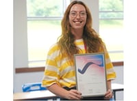 Teacher shows she's top of the class