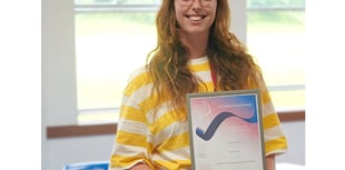 Teacher shows she's top of the class