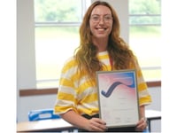 Teacher shows she's top of the class