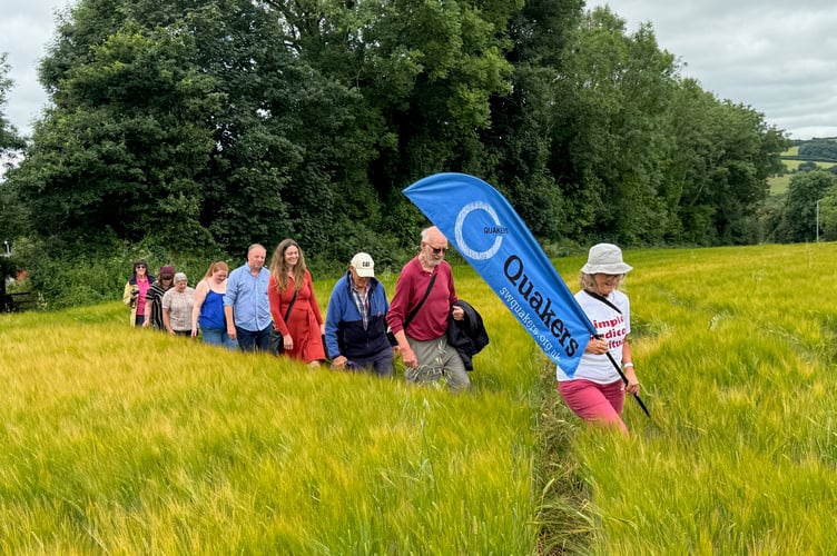 People walking from the waymark to Tregongeeves Farm where Loveday Hambly lived.