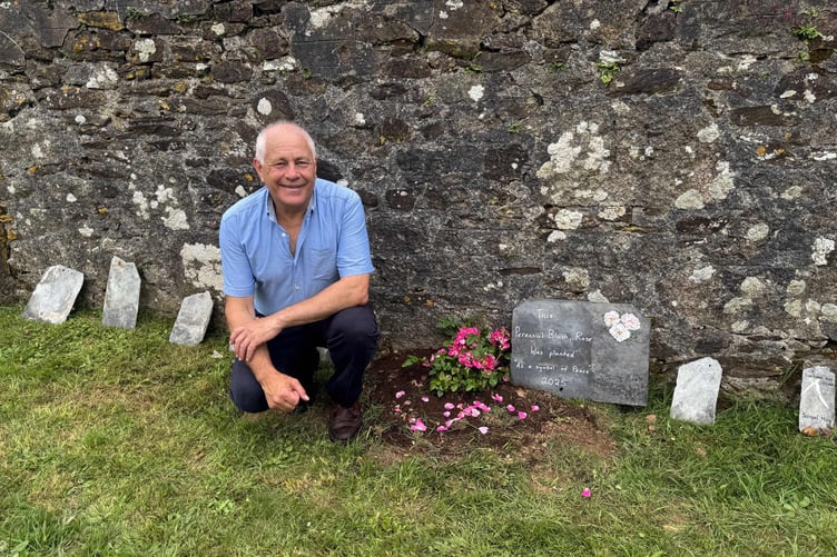 Barry West with the perennial blush rose.