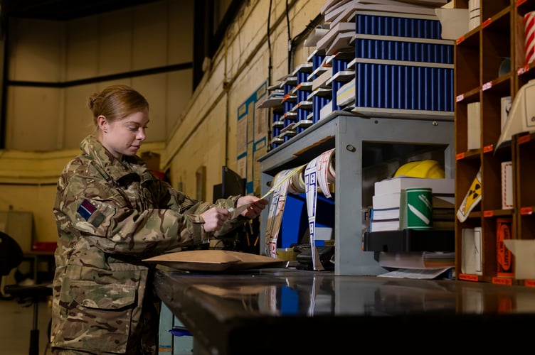 Images of Corporal Chelsie Piddington working in the Reciept and Dispatch department of the Logistic Squadron as a suppler at RAF Waddington. Corporal Piddington is a Permanent Voluntary Regular Reserve for the Royal Air Force.