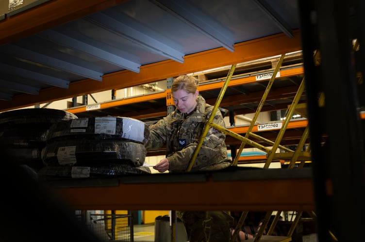 Images of Corporal Chelsie Piddington working in the Reciept and Dispatch department of the Logistic Squadron as a suppler at RAF Waddington. Corporal Piddington is a Permanent Voluntary Regular Reserve for the Royal Air Force.