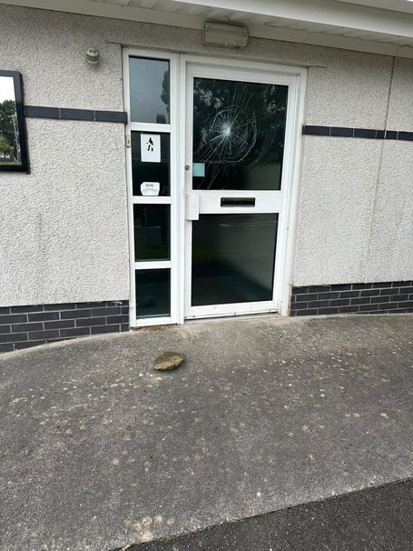 Vandals smashed the door at Saltash Community Fire Station with a rock