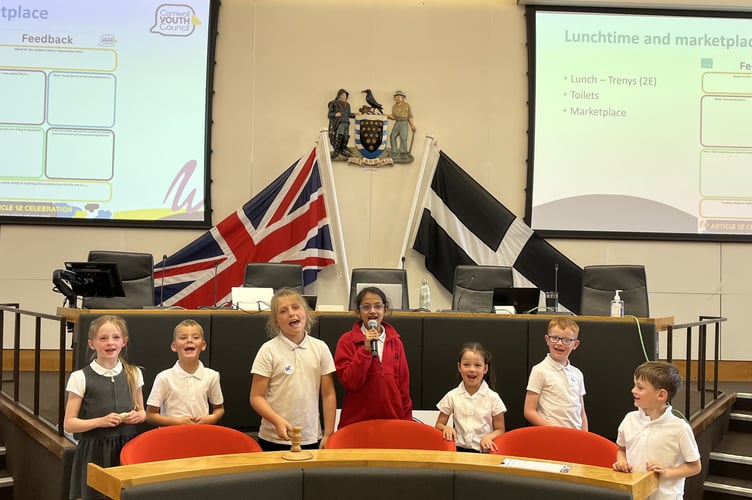 St Day and Carharrack pupils present their recycling campaign in the Council Chamber