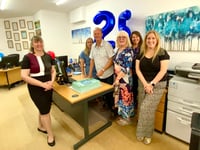 Financial business can count on people to celebrate milestone